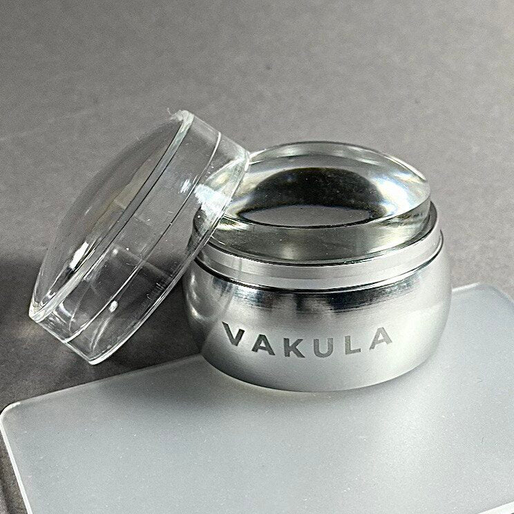 Vakula Stamp With a Scraper