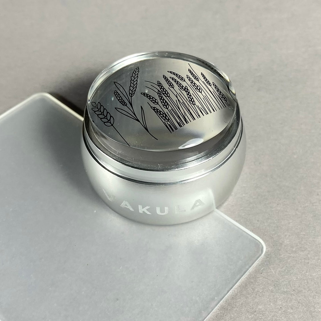 Vakula Stamp With a Scraper