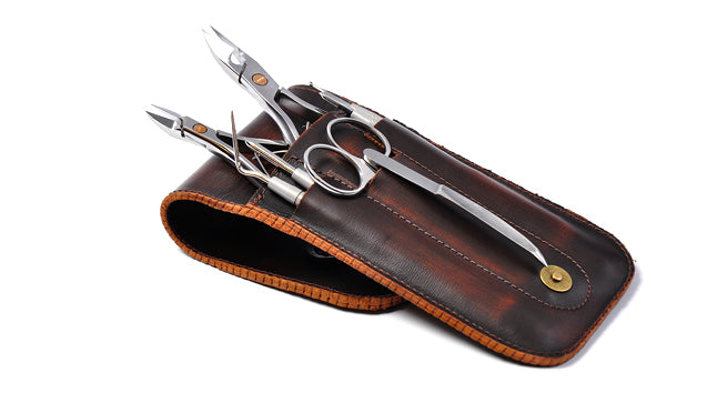Set (cutters, nippers, scissors, pusher) + leather case